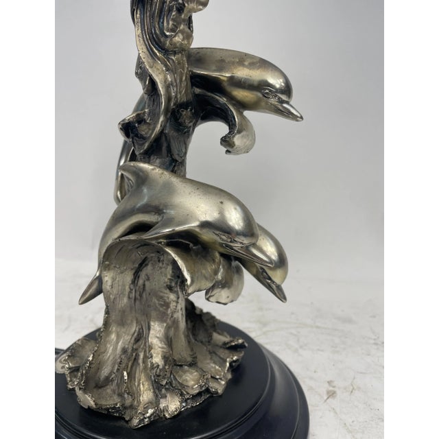 Beautiful lamp with figurative sculpture of Dolphins, laminated in Silver, with hat in Opaque Glass. Made in Italy....