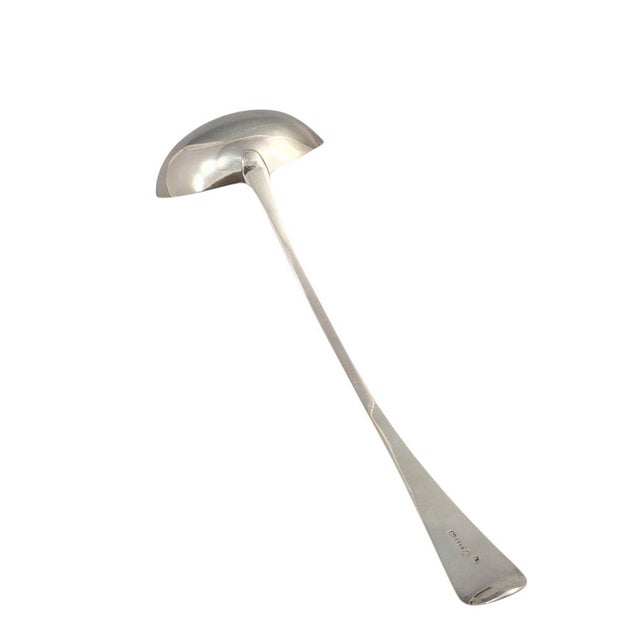 An elegant Georgian sterling silver soup ladle, hallmarked in London in 1800 and made in the classic Old English pattern....