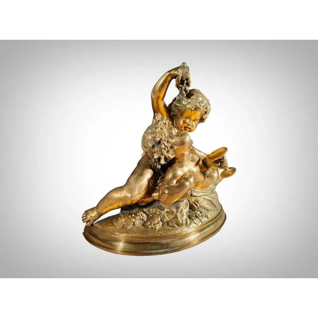 Immerse yourself in the elegance of the 19th century with this refined gilded bronze sculpture depicting the allegory of...
