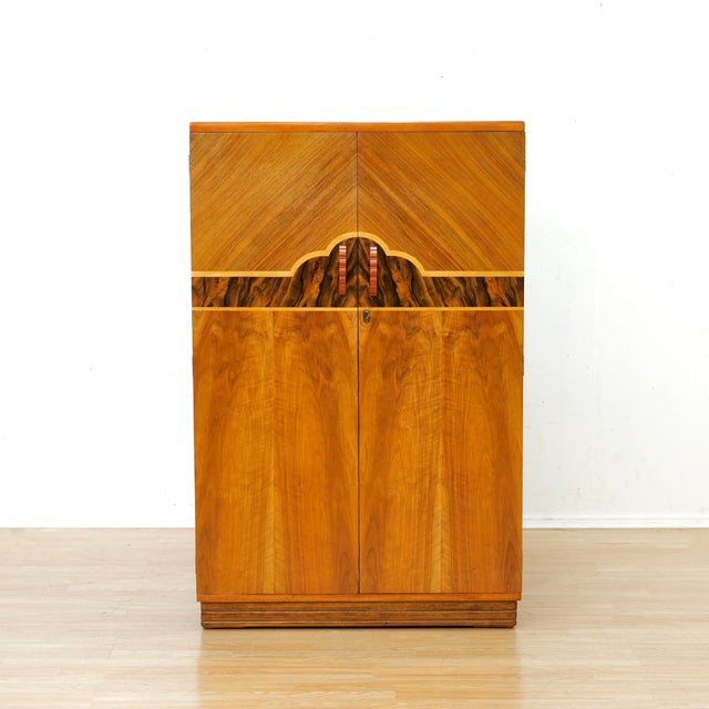 Fantastic Art Deco Shirt Gentleman's Armoire. Produced in stunning English walnut the inlayed doors open to reveal four...
