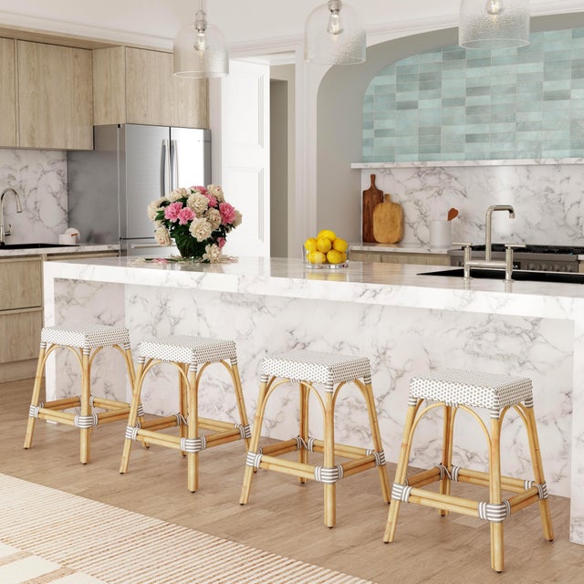 Evoking images of sidewalk tables in the Cote d'Azur, counter stools like this will give your kitchen, dining area, or...