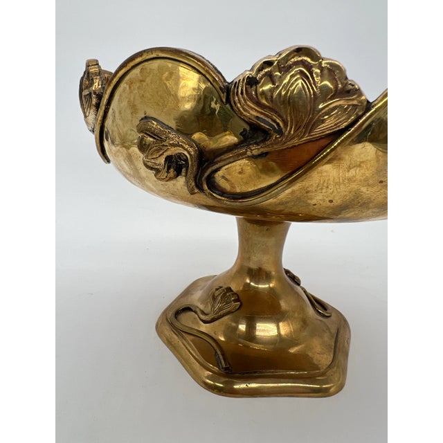 Gorgeous Vintage Brass Art Nouveau Pedestal Bowl. Beautiful art nouveau style brass pedestal bowl with stylized flower...