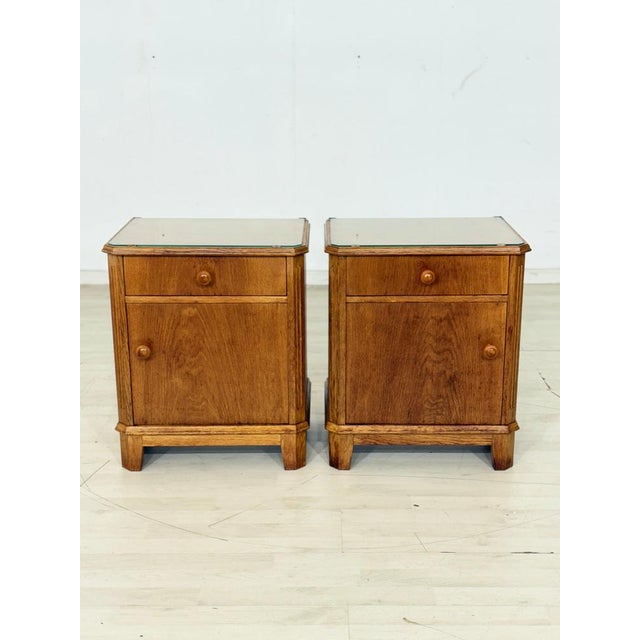 Beautiful pair of bedside tables in a classic vintage style. These two pieces of furniture impress with their simple,...