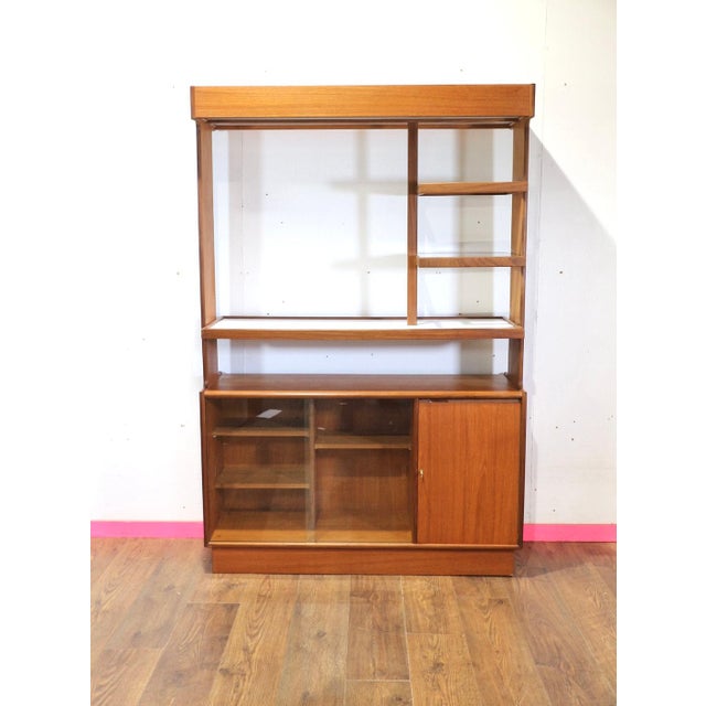 Discover the elegance of the mid-century era with this fantastic mid-century modern home bar cocktail cabinet. Great...