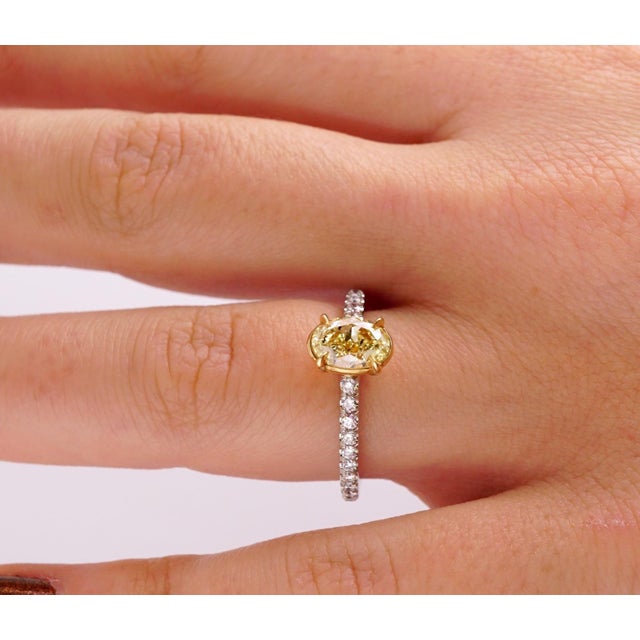 Early 21st Century Fancy Yellow 1.12 Ct Oval Cut Diamond Engagement Platinum Ring, Size 5.75 | Simon Ardem Jewelry For Sale - Image 5 of 5