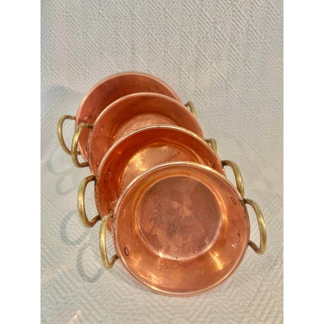 Tapiol produced copper kitchen pieces for export primarily in the 1960's-1980's. This set of 4 jelly or jam pots are ideal...