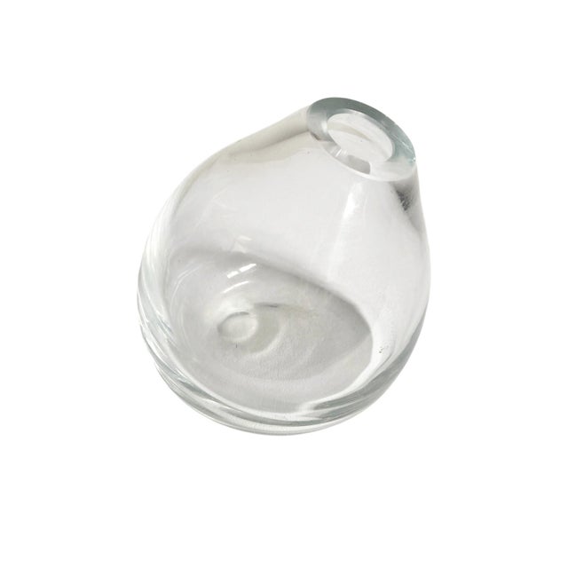 Elevate your floral arrangements with the Slumped Glass Teardrop Bud Vase, a stunning piece that combines elegance and...