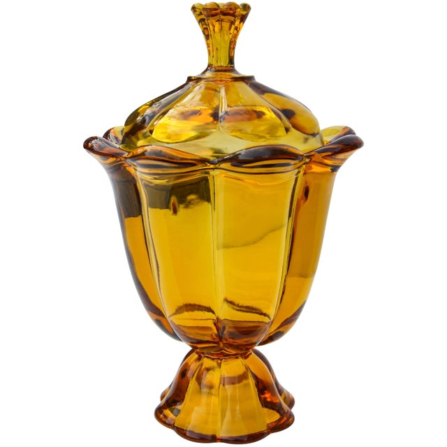 Stunning midcentury honey-gold heavy glass candy jar with lid, elegantly hand-cut with ornate details. No maker's mark....