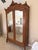 19th-century French Louis XV style country armoire dating to circa 1880, beautifully crafted in hand-carved walnut with...