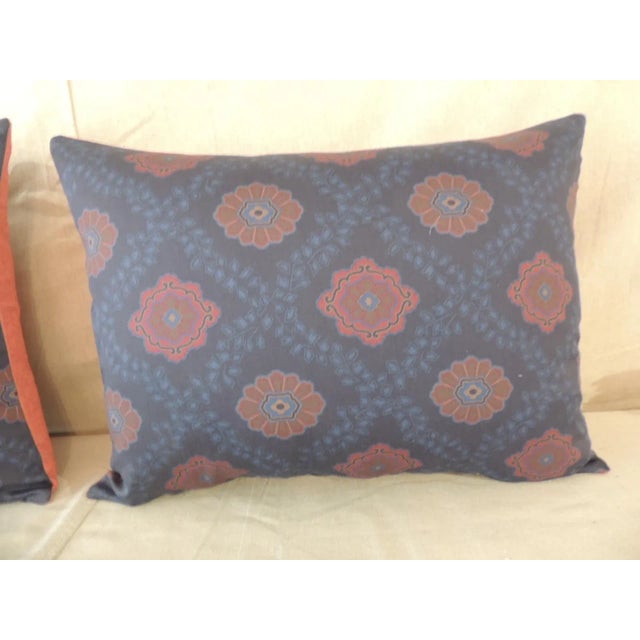 Pair of red and blue satin cotton modern Bolster decorative pillows. Medallion pattern front with soft red textured linen...