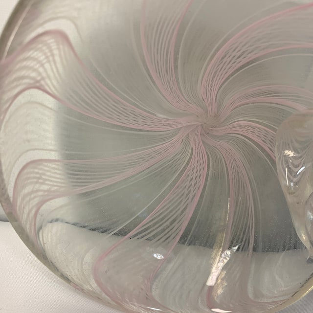 A stunning vintage mid-century modern Italian art glass catchall dish, expertly hand-blown on the island of Murano. Shaped...