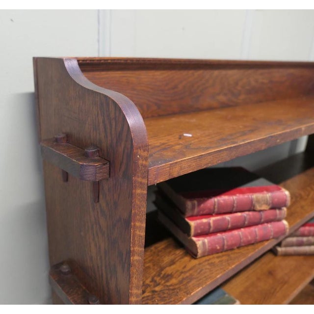 5 Shelf Open Front Arts and Crafts Oak Bookcase. This Oak bookcase has 5 open shelves at varying heights and there is a...