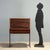 1960s tambour roll-top desk crafted from exotic wood veneer. The functional design features a retractable pull-out top,...