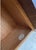 This is a 1970s modern burlwood gentleman’s armoire by John Stuart. It has exceptional storage with open space over...