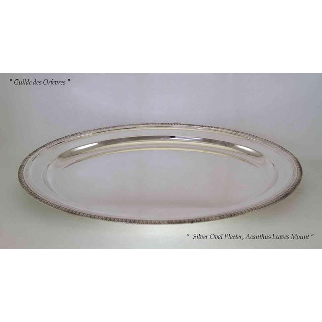 "A Silver Oval Platters 30 in. with Acanthus Leaves Applied Border. Ideal to Serve Fish, Turkey or Venison. Pattern :...