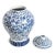 Traditional blue and white porcelain urn with intricate hand painted floral design. Includes removable lid with knob on...