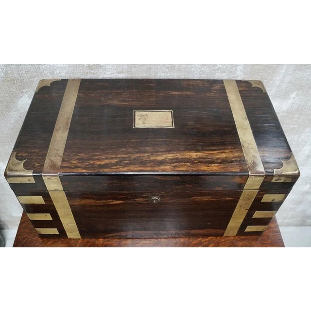 Victorian Coromandel Writing Slope. Made from English Coromandel wood with brass banding, corners and lock plate. C1890...