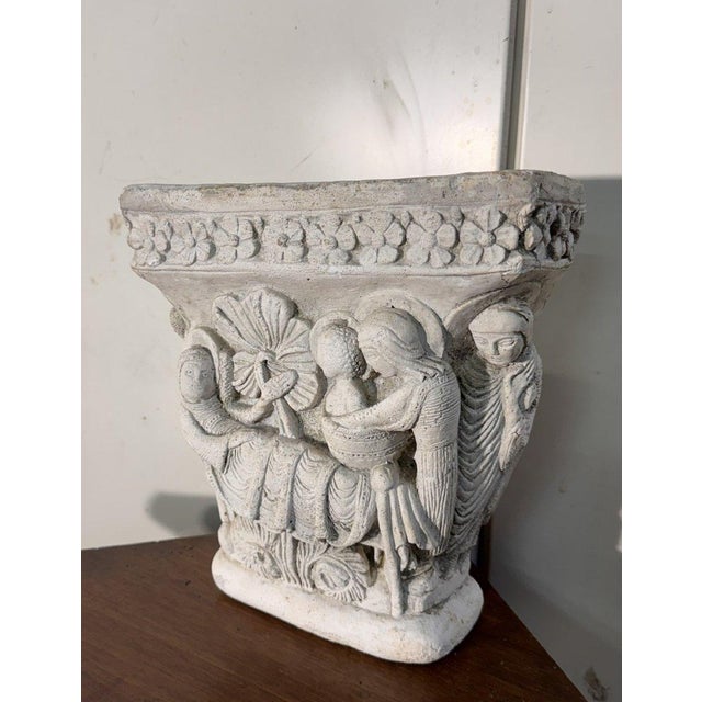 Capital made of reconstituted stone Decorations in the medieval style