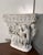 Capital made of reconstituted stone Decorations in the medieval style