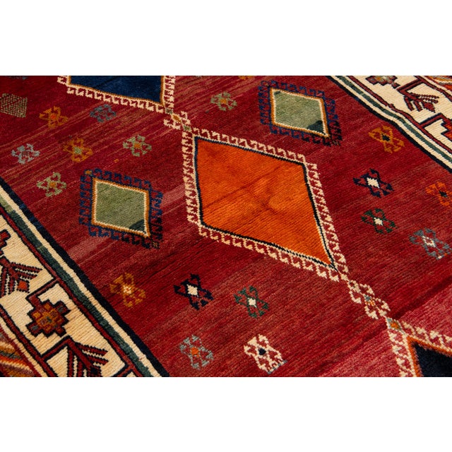 Textile 4 X 7 Room Size Persian Shiraz Wool Rug in Red With Tribal Motif For Sale - Image 7 of 8