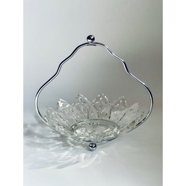 A mid 20th century glass appetizer dish with holder for spoon or fork.