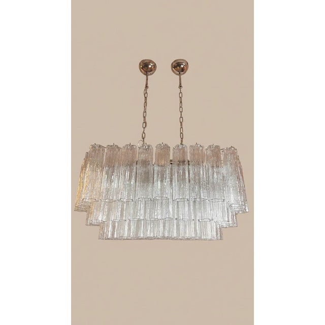 DUTIES FREE US/AU/EU WIRED Murano glass chandelier with 72 clear mouth-blown tubes in a radial star shape, polished nickel...