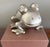 A sculptural metal frog by Romeo Sozzi for Promemoria, part of the brand's signature "Frogs and Games" collection. The...