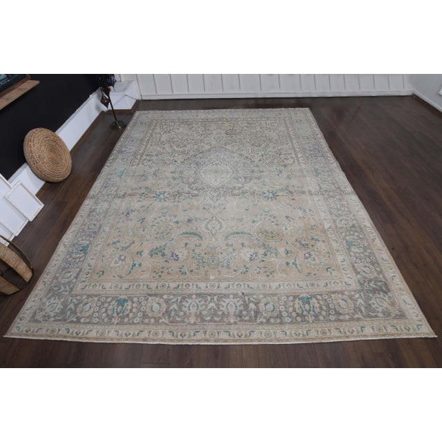 Vintage Persian Hand-Knotted area rug is a semi-antique vintage area rug. The '70s Eastern region of Anatolian's unique...