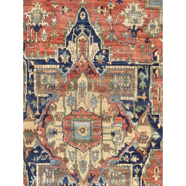 The Serapi Collection reinterprets traditional tribal geometric design through a refined palette. Each rug is hand-knotted...