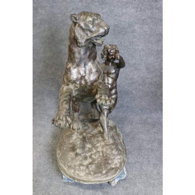 Unique Life-Size Pair of Bronze Large Lion and Tiger Protecting Children For Sale - Image 12 of 12