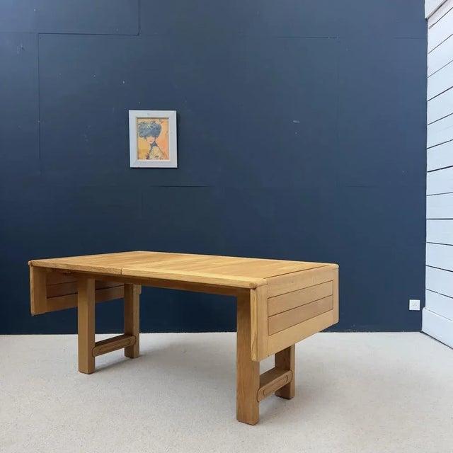 Extenable dining table in solid oak of the 2 French designers Robert Guillerme and Jacques Chambron for the "Your Maison"...