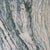 16.25"h, 57.75"w, 39.25"d - Green and beige marble, possibly Cipollino marble - One eye-shape slab that rests on two...