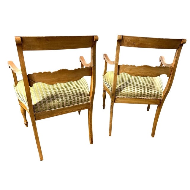 Pair of Antique Armchairs Carved Wood with fairly new Green Polka Dot Upholstery. Approximate Size: 24" x 20" x 36" each...