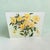 Large original floral oil painting by Francis Downs, featuring an airy arrangement of brilliant yellow tropical flowers...