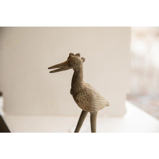:: Vintage handmade African bird sculpture. Circa late mid 20th century, though possibly older, this piece has such...