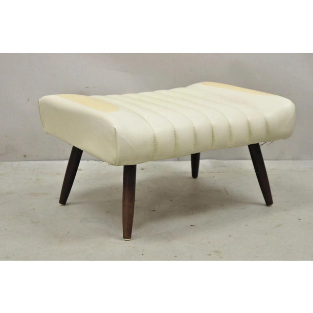 Vintage Mid Century Modern Adjustable Angle Ottoman Footstool with Wooden Legs. Circa Mid 20th Century. Measurements: 12"...