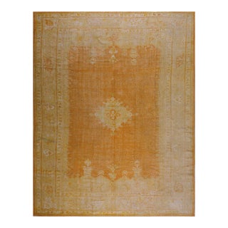 Supreme Peach Color With a Small Detail Medallion Antique Turkish Oushak Rug For Sale
