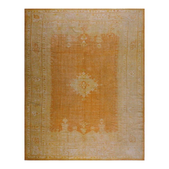 Supreme Peach Color With a Small Detail Medallion Antique Turkish Oushak Rug For Sale