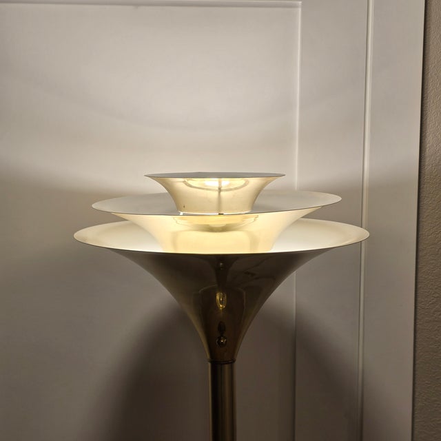 Unique triple tier torchiere in gold/brass color. Possibly Wick Design by Casella. The individual funnels are layered for...