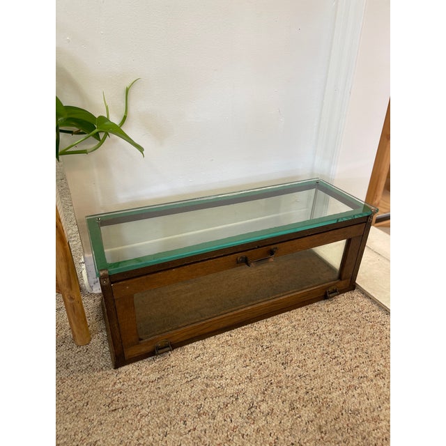 This antique countertop display case was produced by Alfred Noack, a noted early 20th-century maker of "High Grade Show...