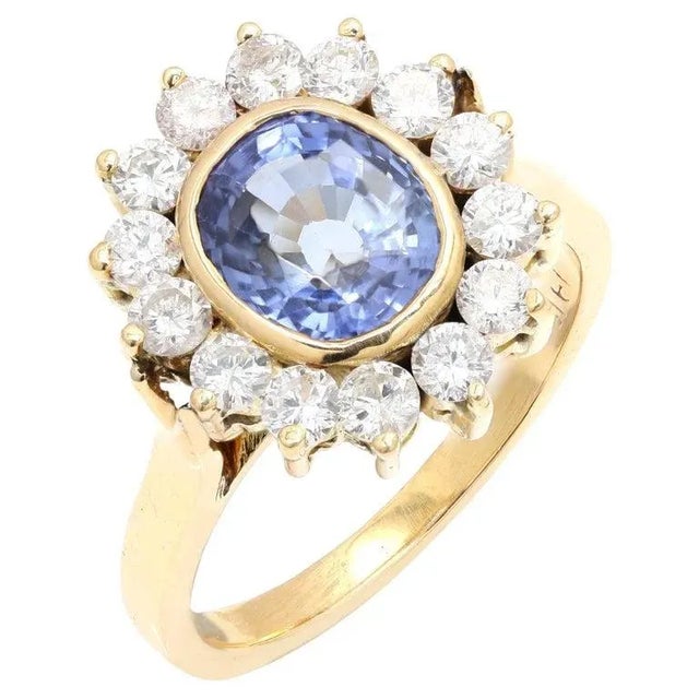 This is part of Chairish’s Fine Jewelry assortment. 3 ct Sapphire and Diamond Ring in 18K Gold featuring natural sapphire...