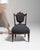 Carved wood side chair in Charcoal Grey. Its charcoal grey finish sets off upholstered button-tufted back in charcoal...