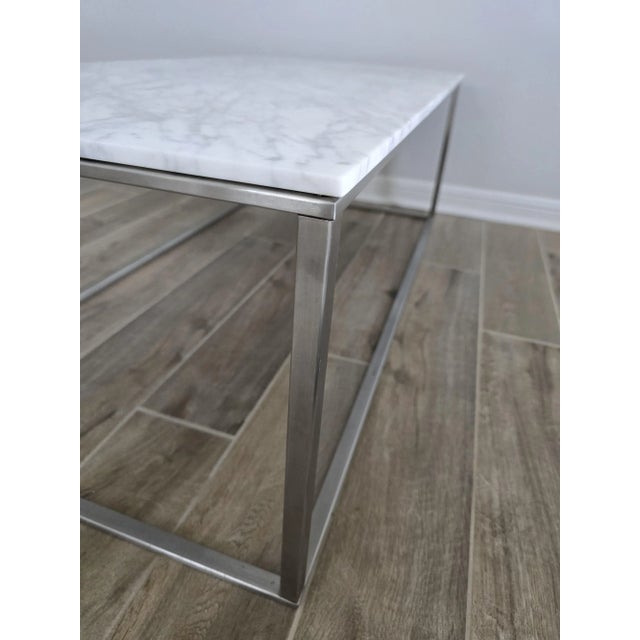 Blu Dot minimalista coffee table. Stainless steel coated base with honed marble stone slab. 2 pieces - approximately 125...
