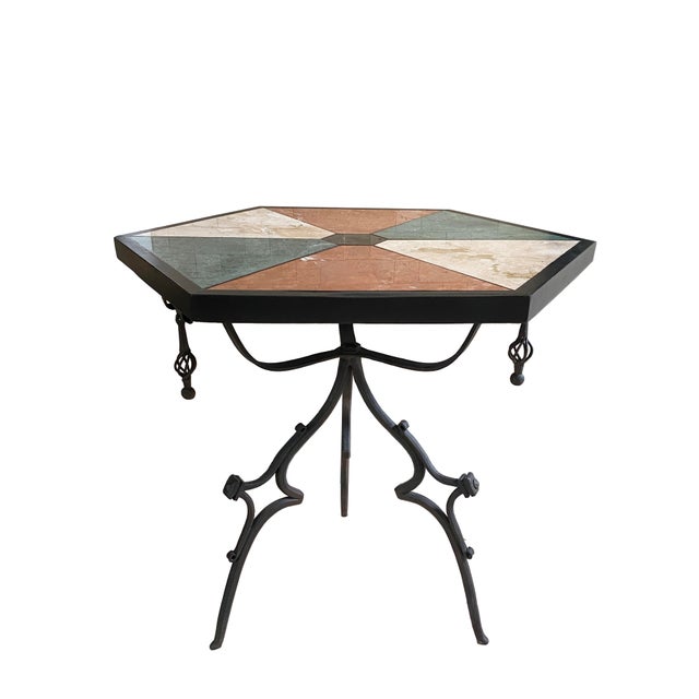 Rare and very cool gothic mid-century style side table! The base is a piece of art, a trio of hand-forged wrought iron...