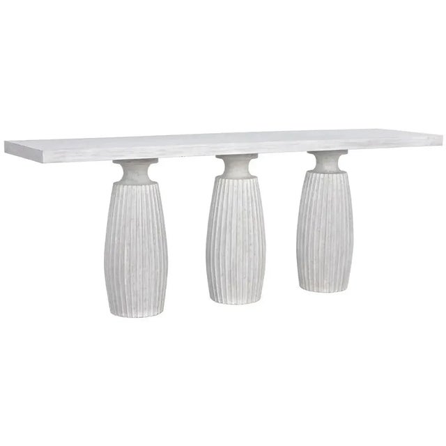 The strength and grace of a classic fluted pillar design is featured on this three-legged console. The rare accent piece...