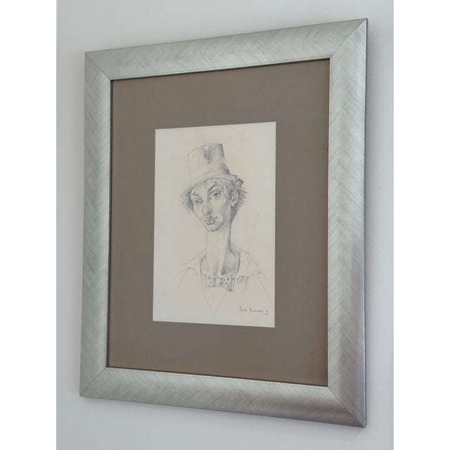 A rare and exceptional original graphite pencil drawing of a melancholic clown profile by the prominent Italian Surrealist...