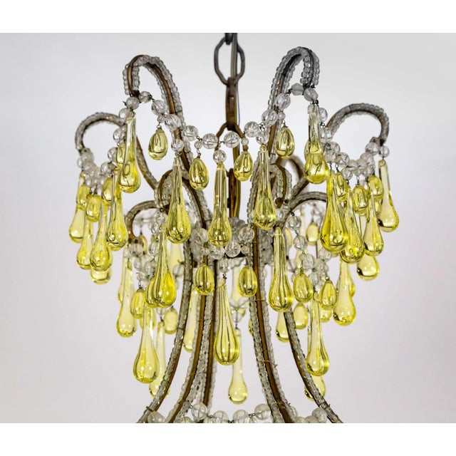 This stunning chandelier with rare pale-yellow bobeches and drop crystals was made circa the mid-1800s and was originally...