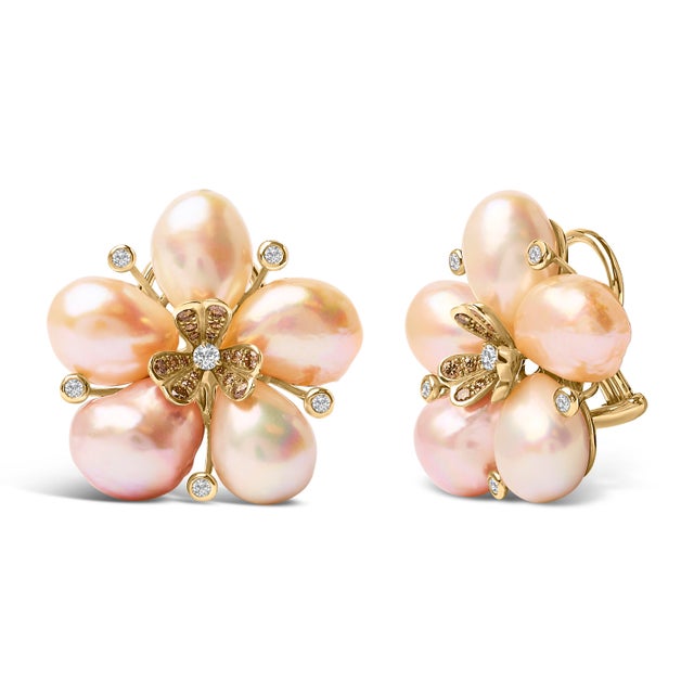 Immerse yourself in the ethereal elegance of these 18K rose gold earrings, where sophistication meets mother nature's...