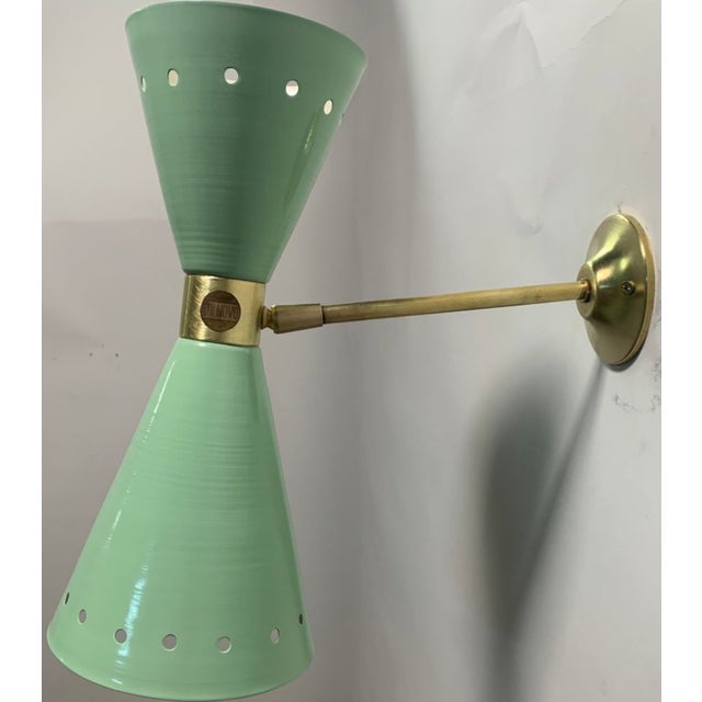 Rare Diabolo model wall light by Stilnovo, an authentic masterpiece of Italian design from the 1950s. This elegant wall...