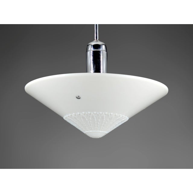 Product Description: This exquisite pendant light is a rare vintage gem from the 1930s. The original conical, opaline...